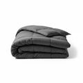 Couverture lestée grise NightRitual pliée montrant la qualité du tissu et des coutures.