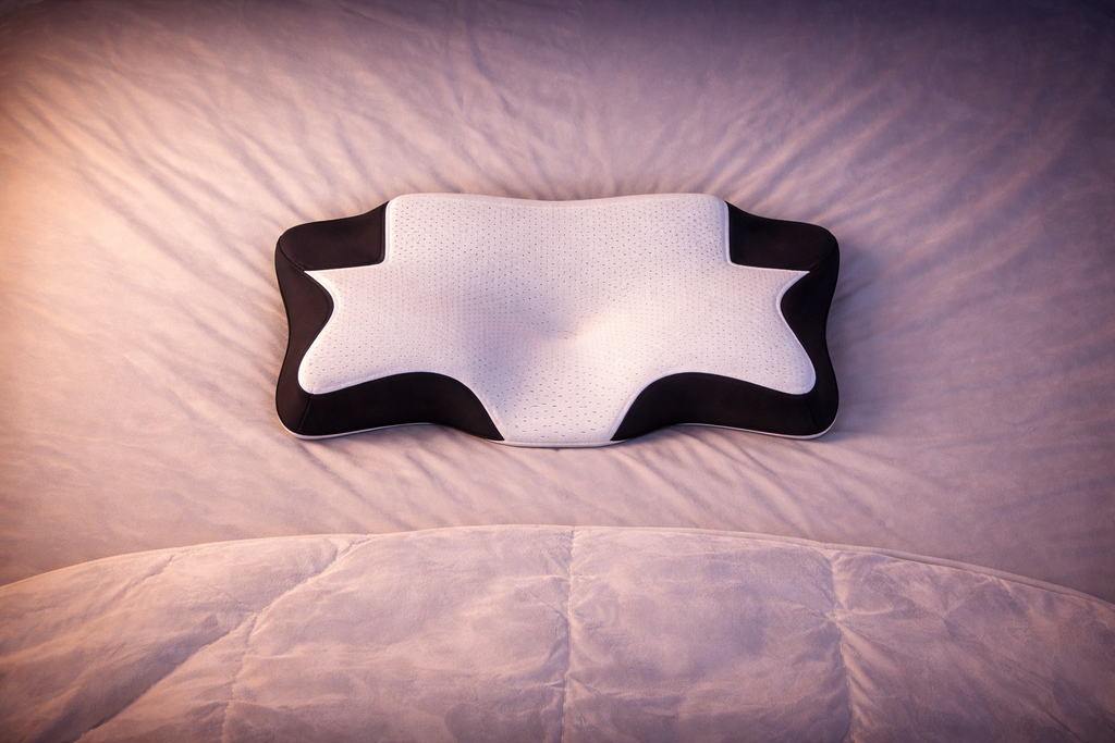 Gros plan sur la mousse à mémoire de forme haute densité de l'oreiller NightRitual.